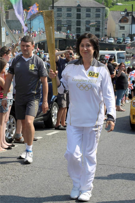 Jackie Davies carrying the Olympic Torch
